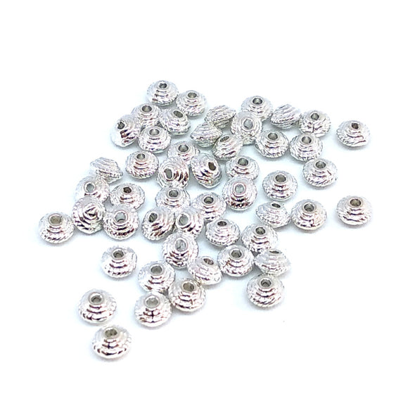 Silver Small Patterned Bicone Beads - Beading Amazing